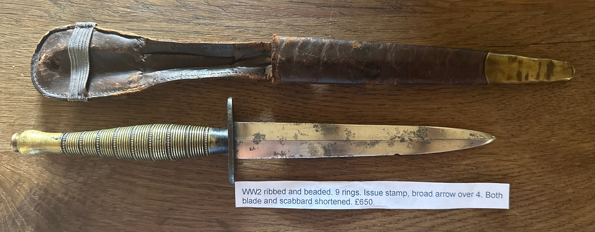 Fairbairn Sykes Commando Dagger - shortened WW2 Issue ribbed and beaded 9 rings, rare with issue stamp broad arrow over 4.