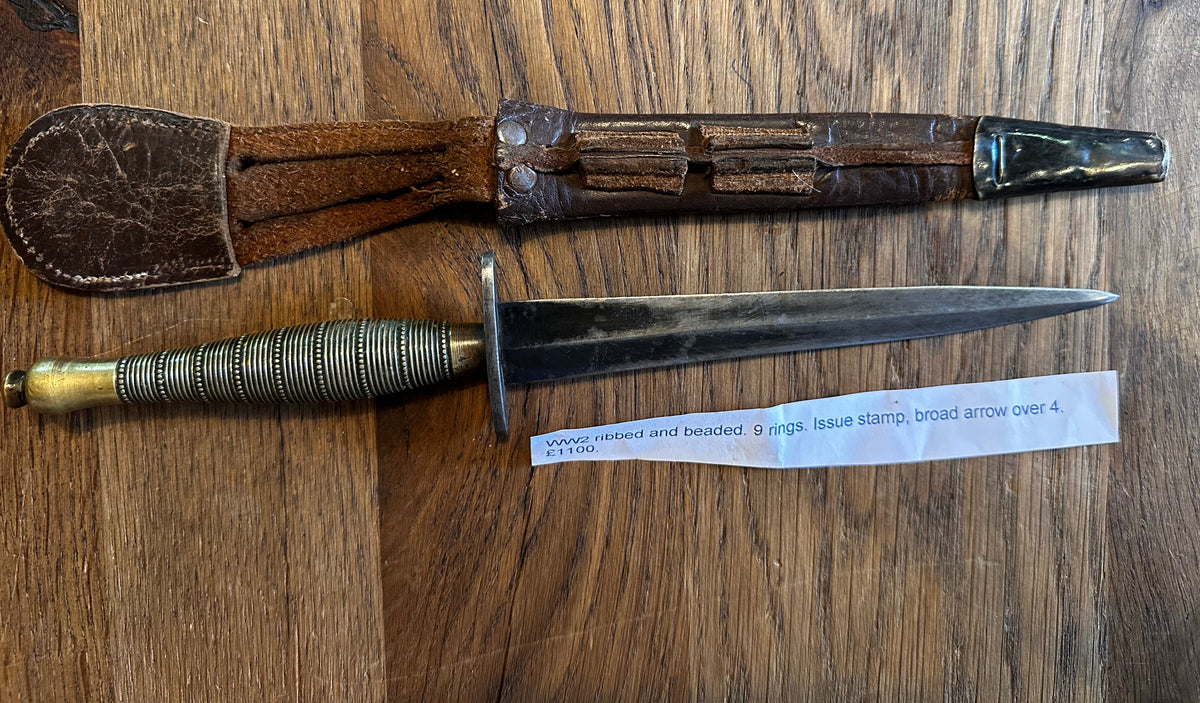 Fairburn Sykes Commando Dagger - WW2 Issue ribbed and beaded 9 rings, rare with issue stamp broad arrow over 4.
